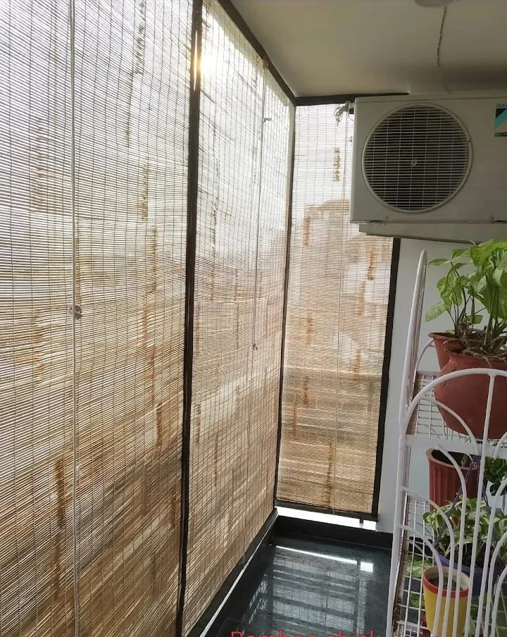 Floor-to-Ceiling Balcony Seasoned Natural Bamboo Chick Blinds with Green Canvas Trim